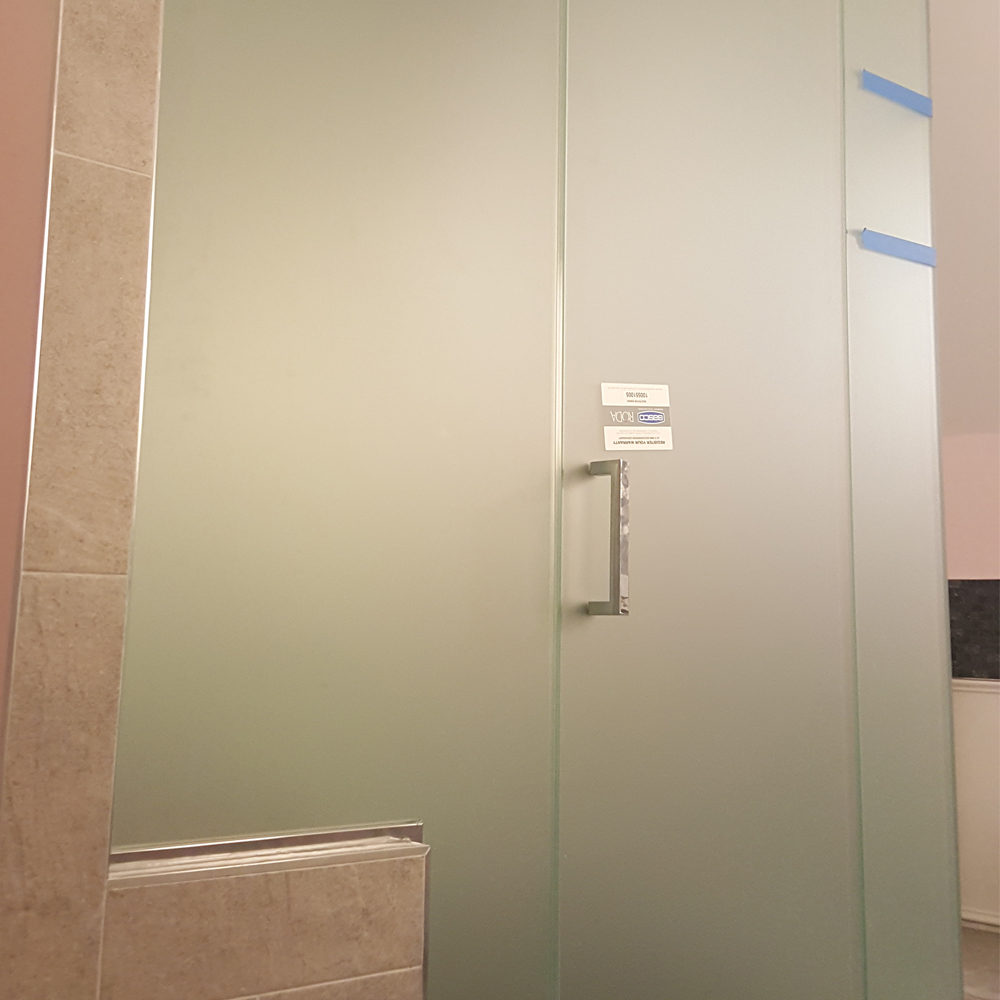 Frosted glass shower door by The Shower Door Specialists